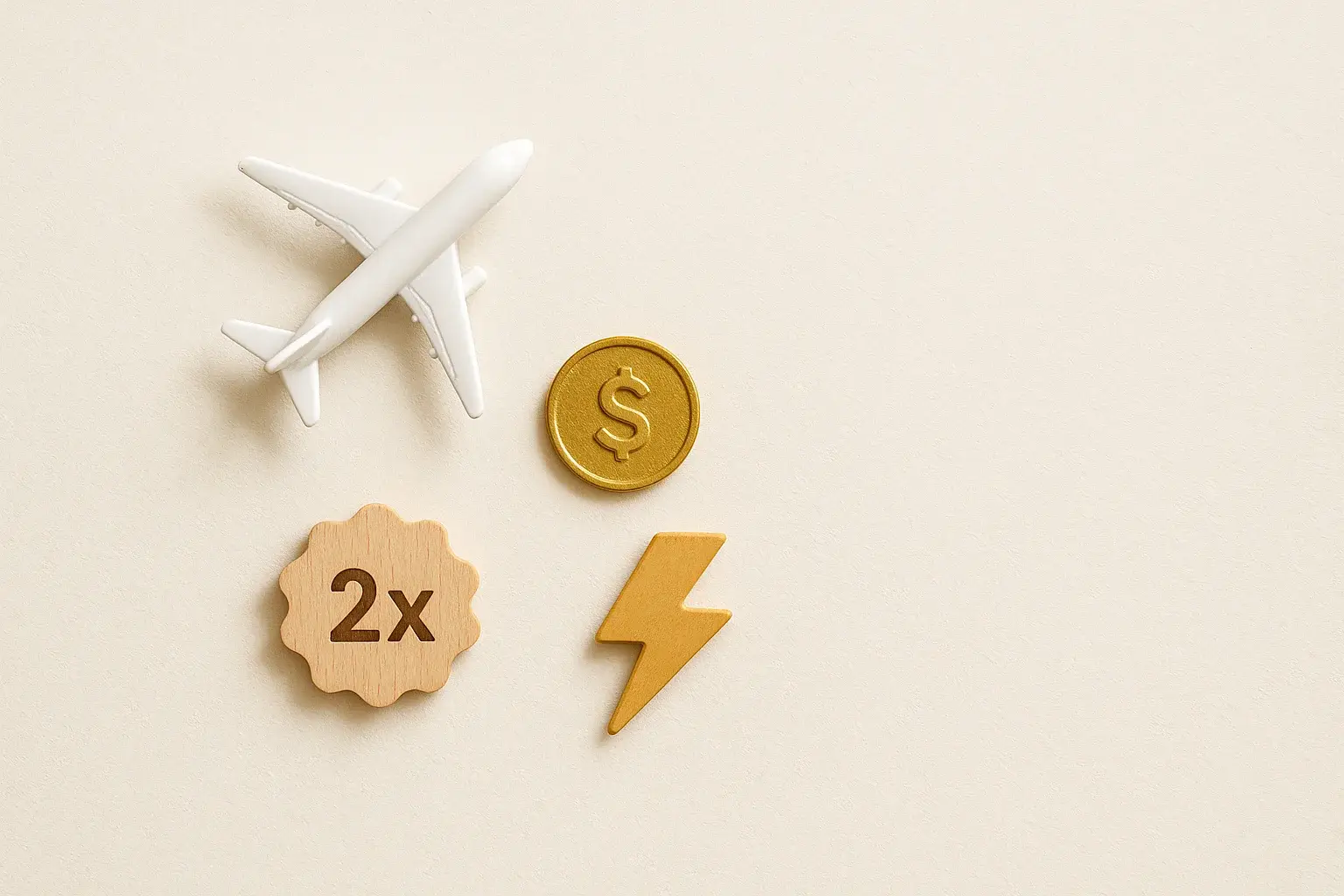 Overhead flat lay with airplane figurine, gold coin, lightning token, multiplier badge
